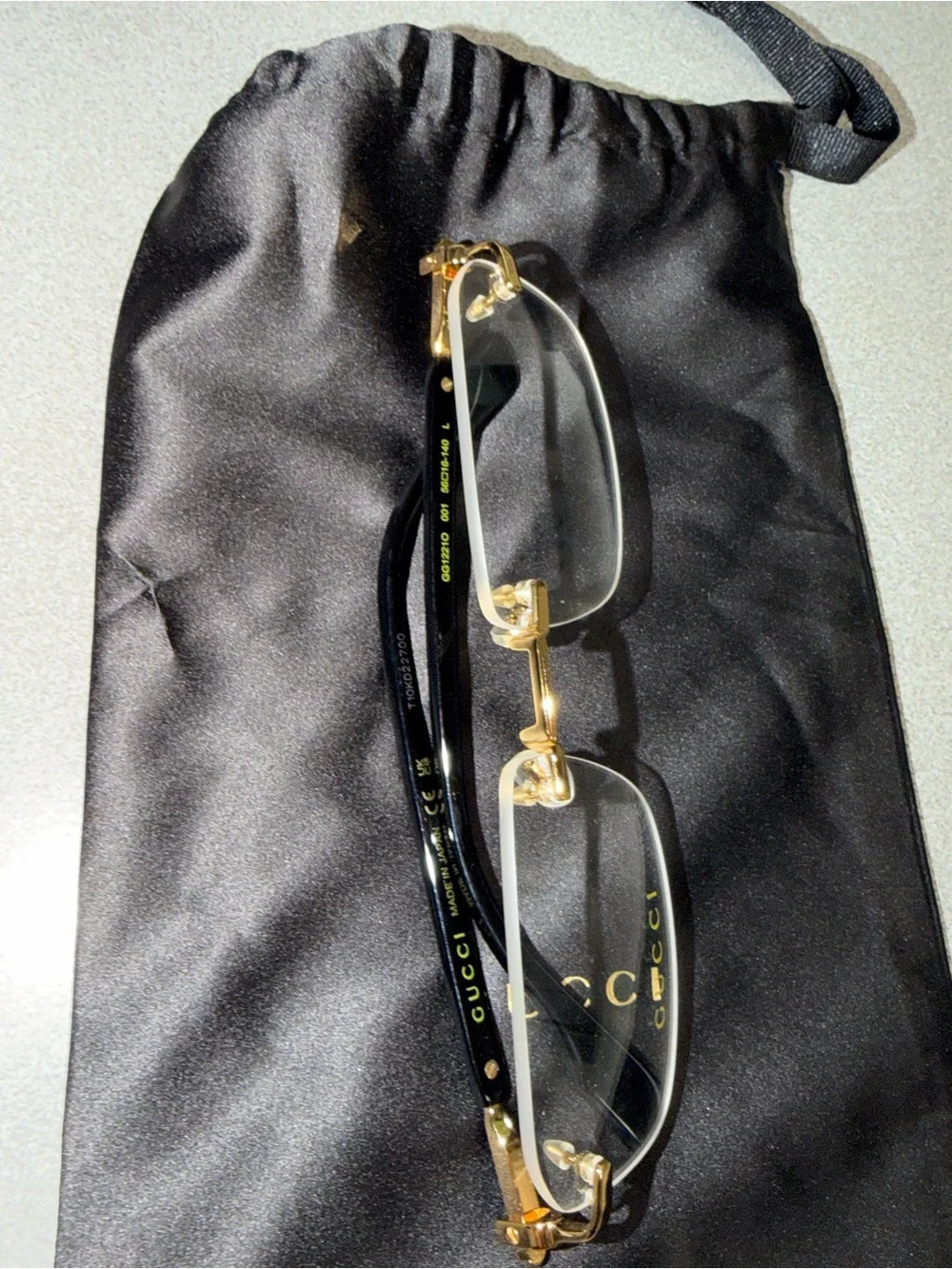 Gucci Men’s Rimless Eyeglasses Gold and Black Accents